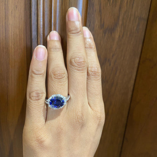 Oval Blue Sapphire Diamond Halo Ring