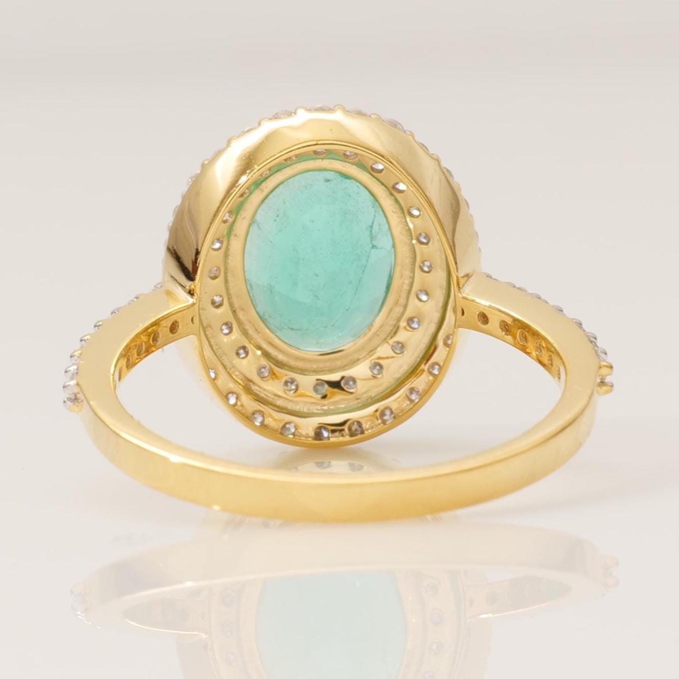 Oval Emerald Double Halo Diamond Ring