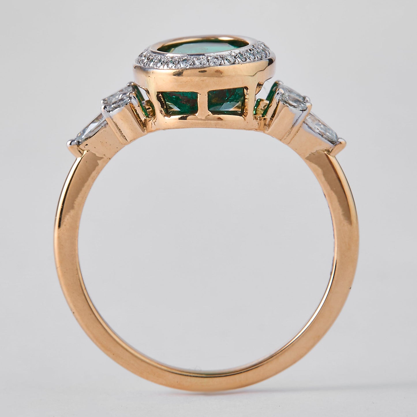 Oval Emerald Halo Diamond Ring