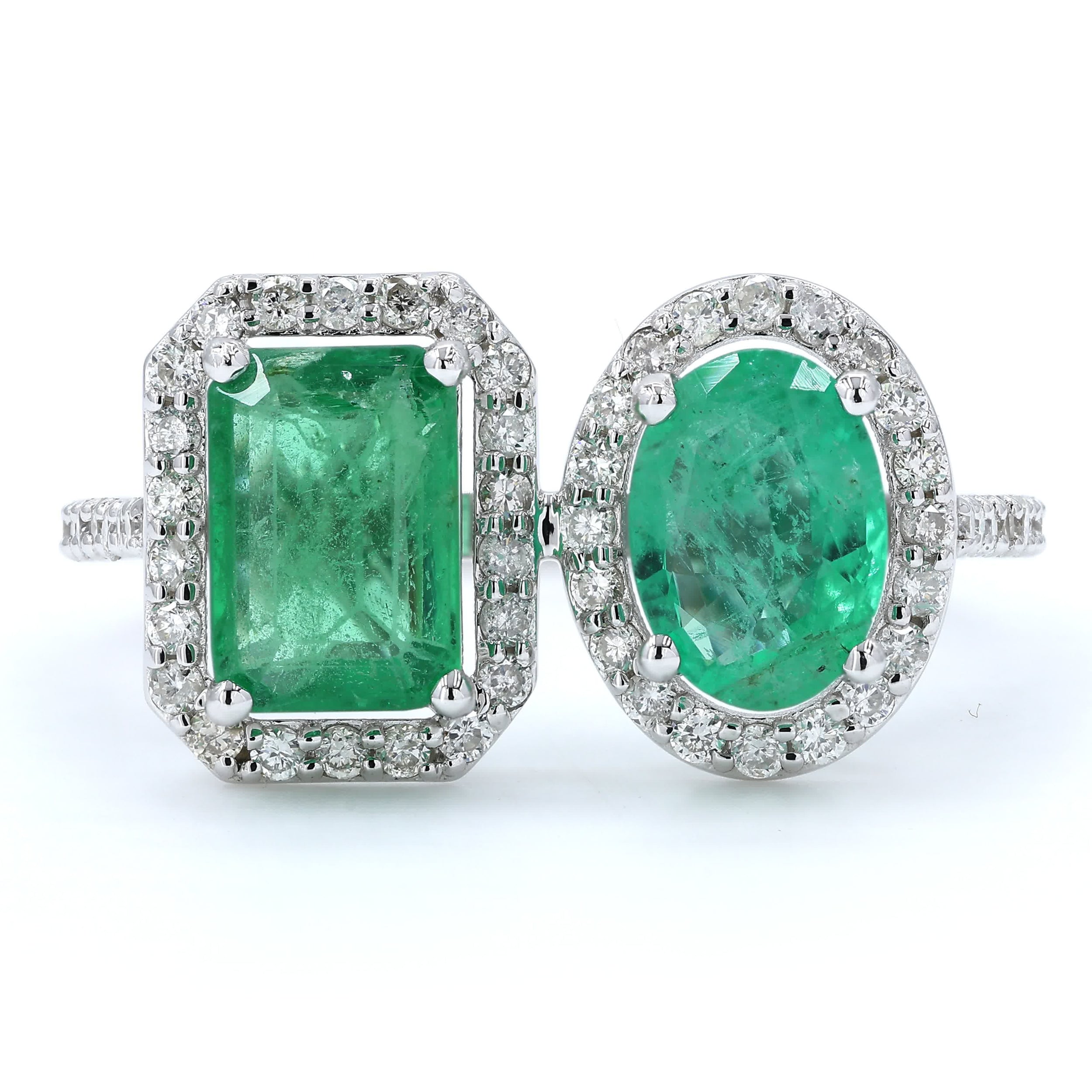 Emerald Oval and Emerald Cut Diamond Halo Ring