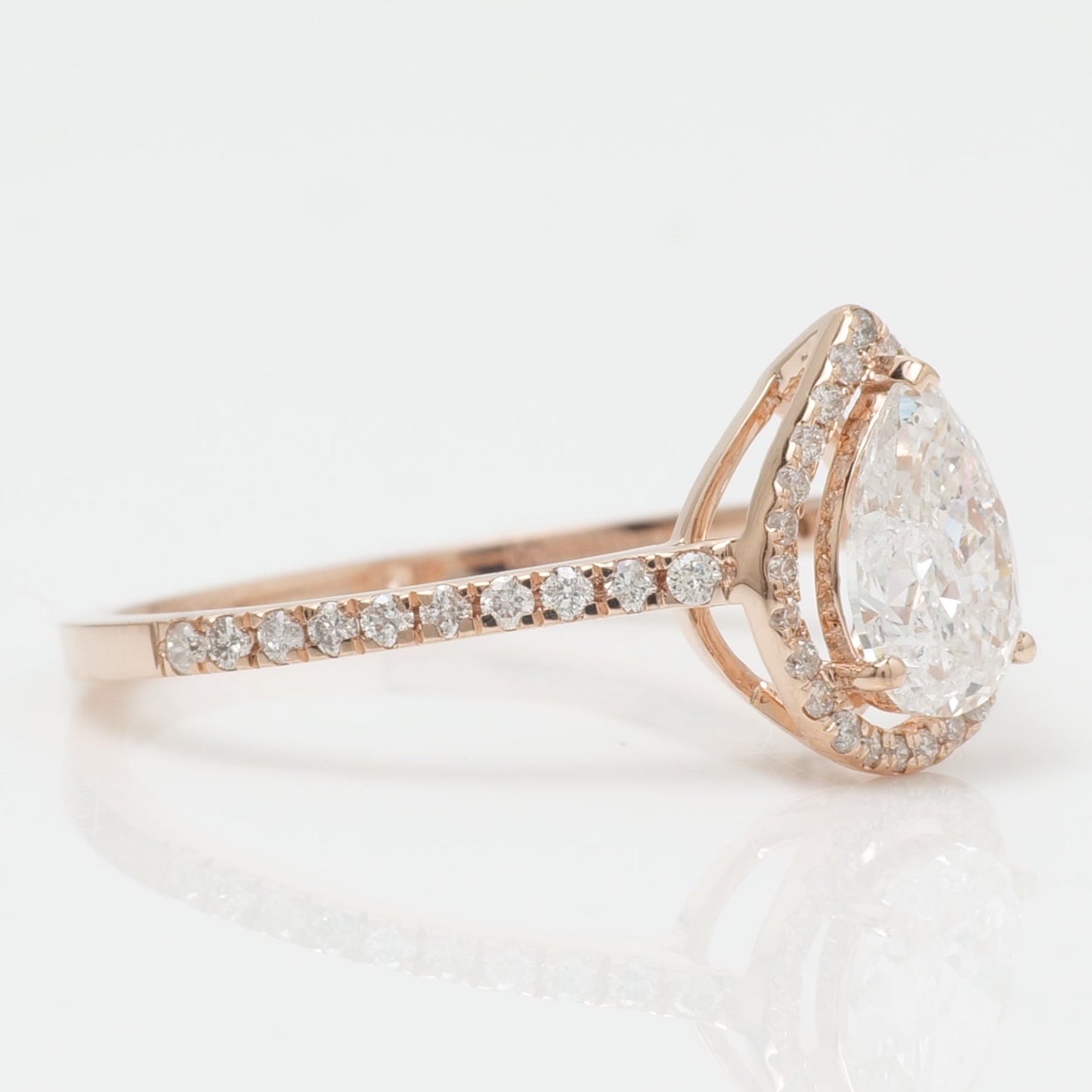 Pear Solitaire Halo Diamond Ring