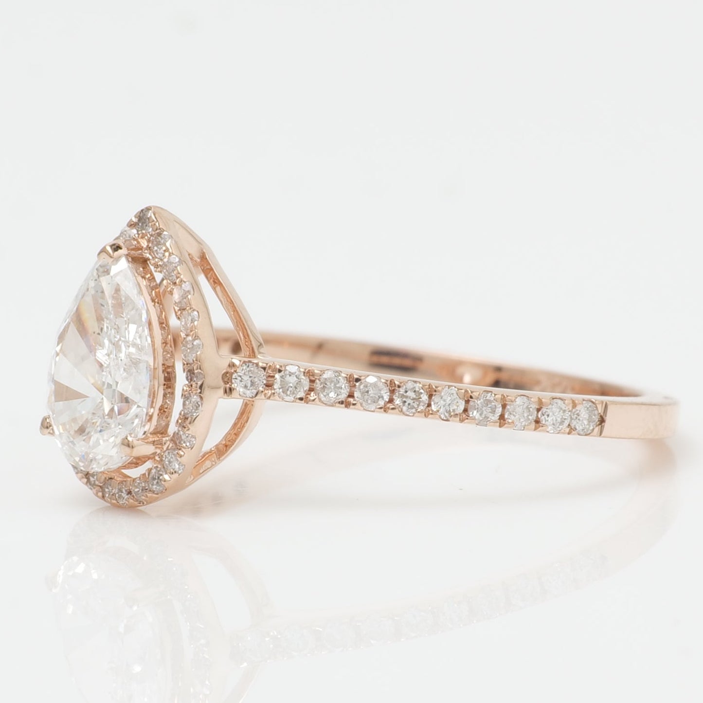 Pear Solitaire Halo Diamond Ring