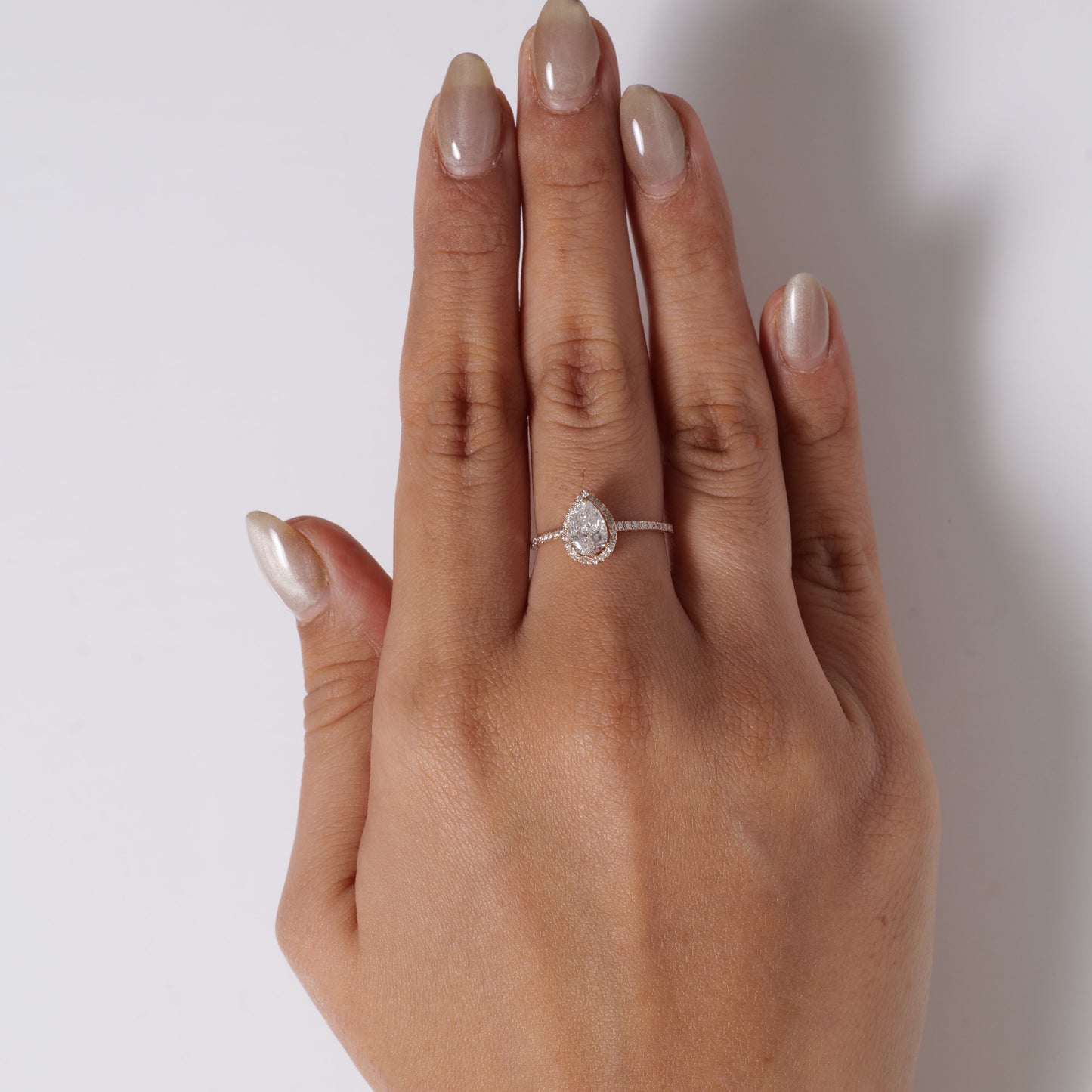 Pear Solitaire Halo Diamond Ring