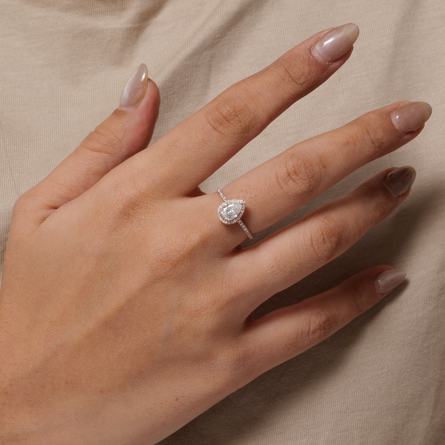 Pear Solitaire Halo Diamond Ring