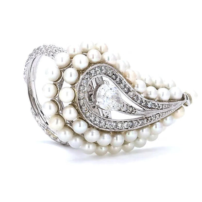 Angled view of the layered pearl cluster — 14K white gold ring with natural diamonds