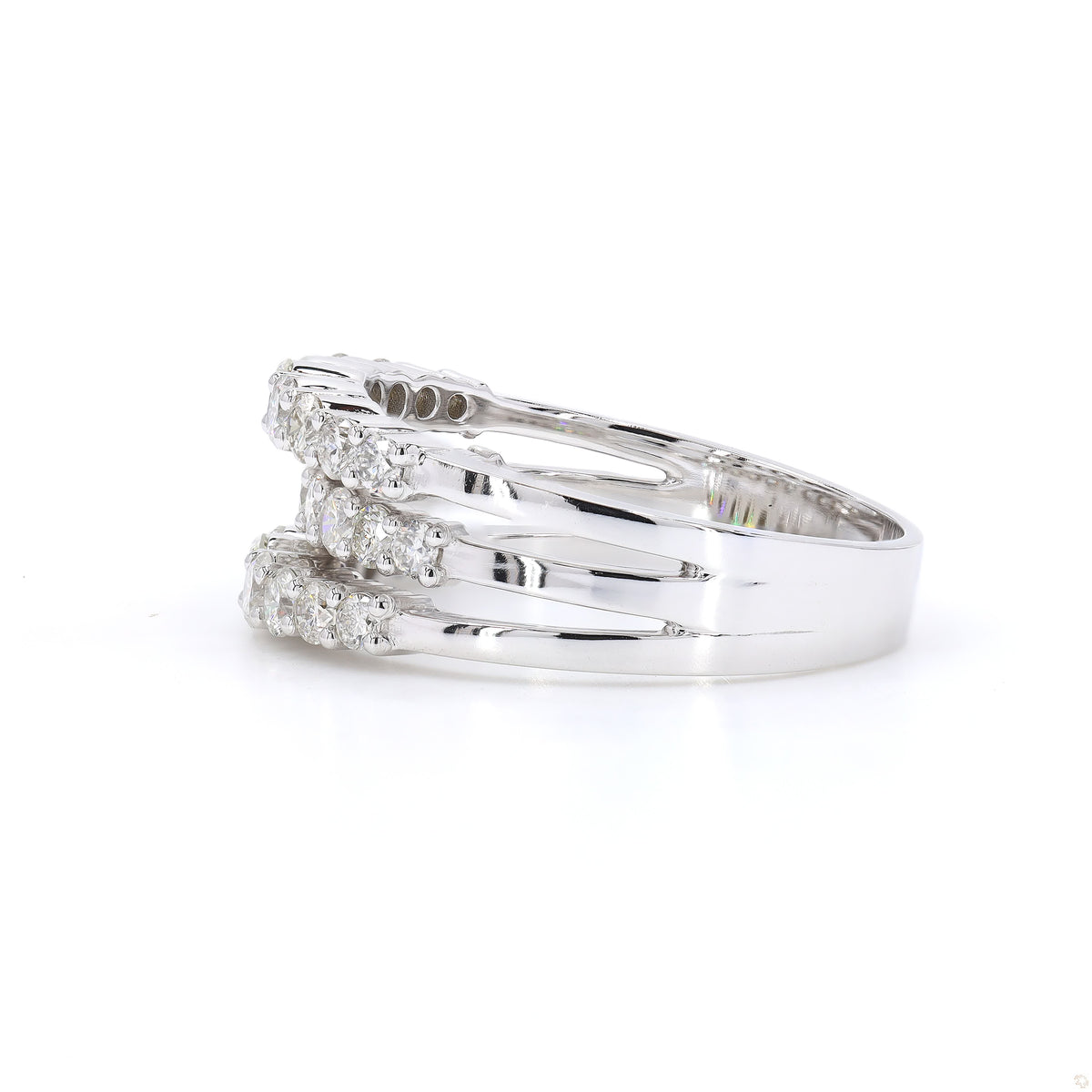 Triple row pavé natural diamond band ring in 14K white gold, angled to show light across the three rows.