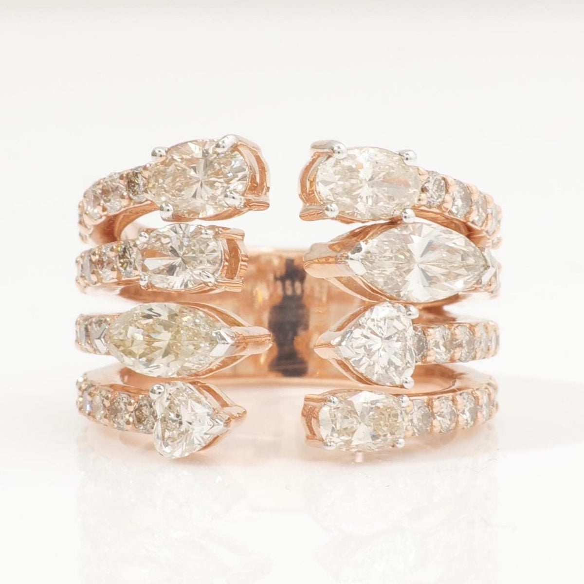 Front view of the broad band ring — 14K yellow gold with prong-set marquise, oval and heart natural diamonds