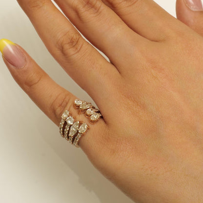 Worn on the hand — 14K yellow gold multi-row diamond band with a scattered fancy-shape cluster