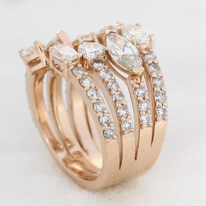 Close-up of the marquise centre diamond — 14K yellow gold ring with prong-set natural diamonds