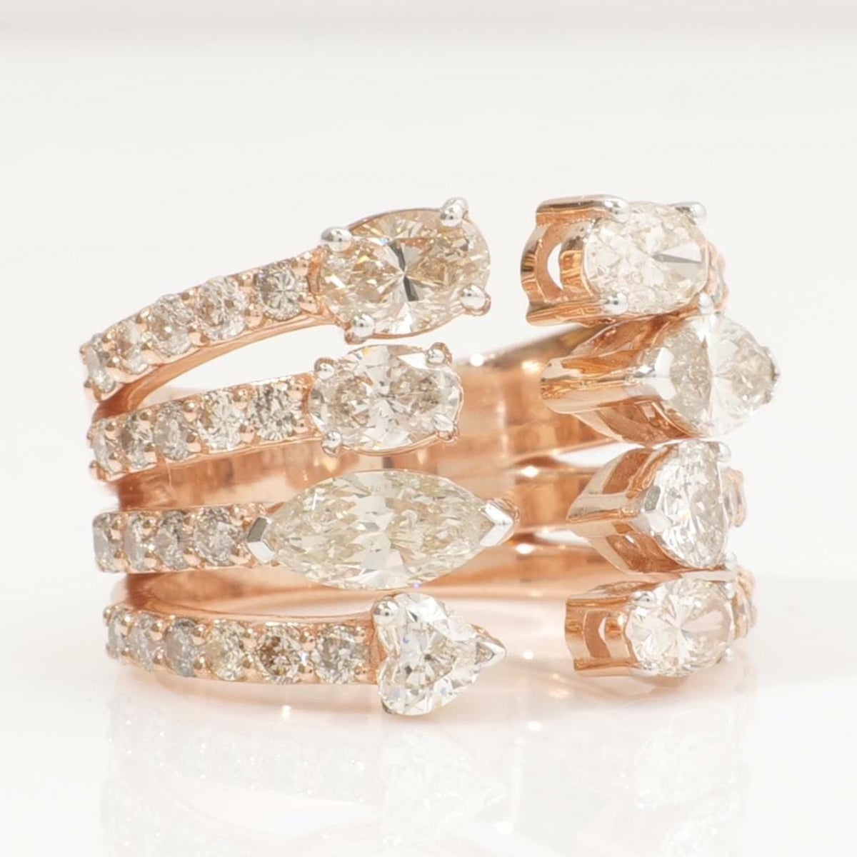 Angled view showing the split shank — 14K yellow gold broad band with pavé-set round diamonds