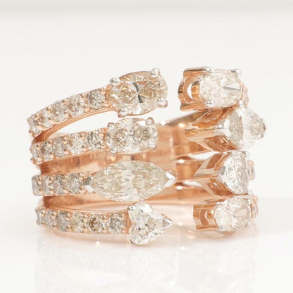 Angled view showing the split shank — 14K yellow gold broad band with pavé-set round diamonds