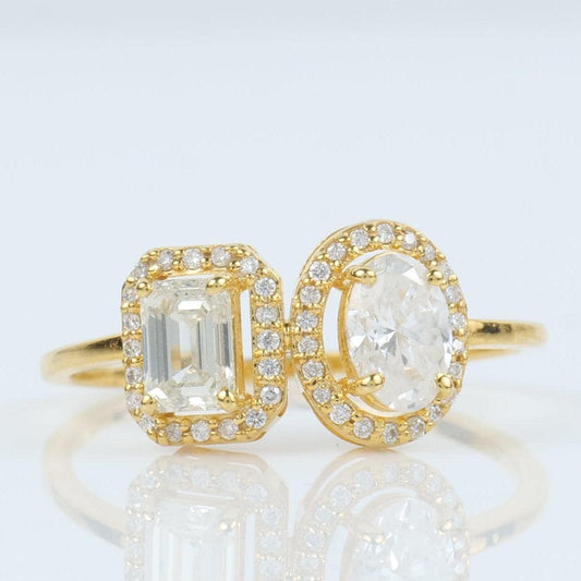 Oval and emerald cut natural diamond Toi et Moi ring in 14K yellow gold, front view