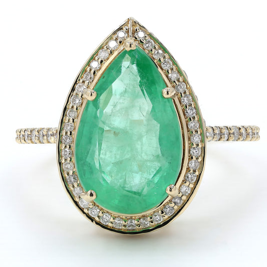 Front view of the pear emerald halo ring — 14K yellow gold with a green emerald and natural diamonds