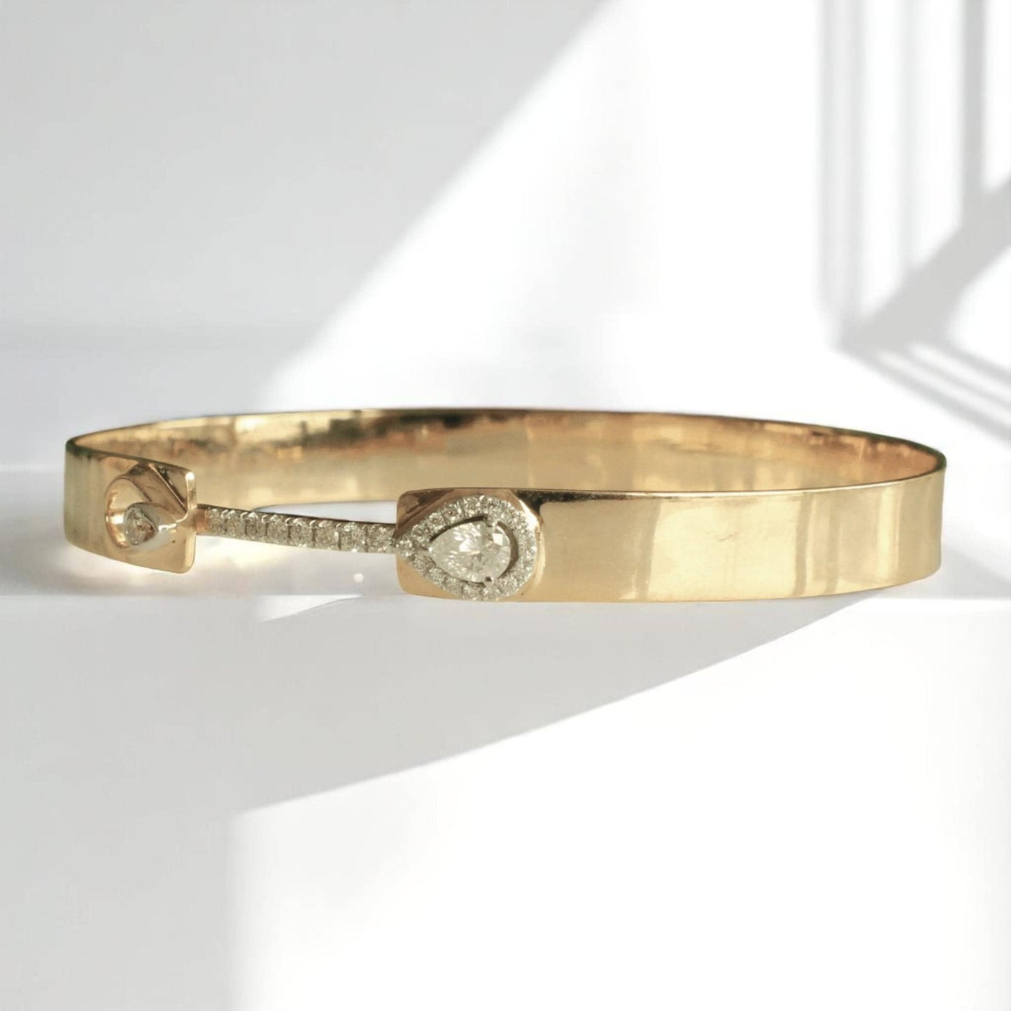 Teardrop Bridge Diamond Bangle
