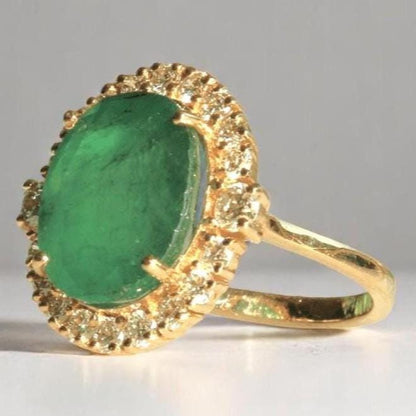 Oval Emerald Halo Diamond Ring
