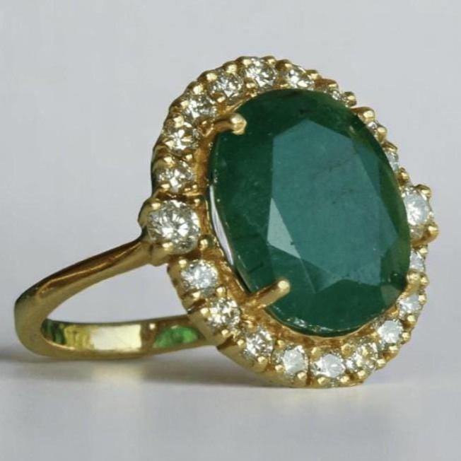 Oval Emerald Halo Diamond Ring
