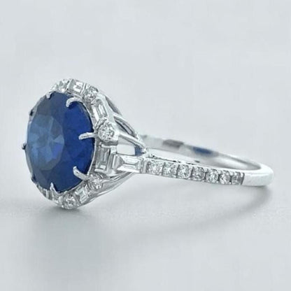 Oval Blue Sapphire Diamond Halo Ring