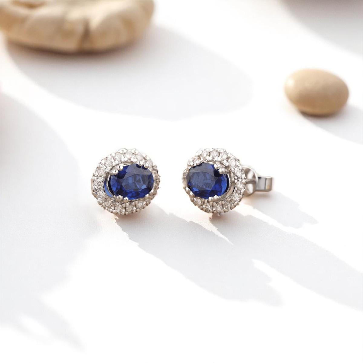 Oval Blue Sapphires Halo Diamond Earrings