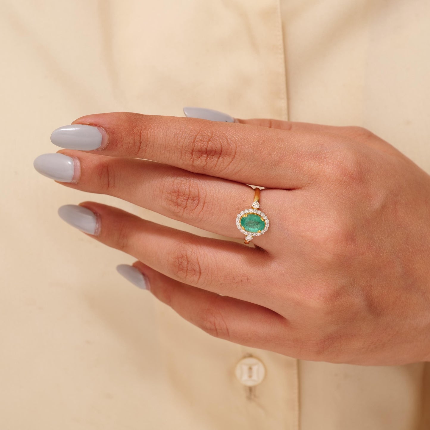 Oval Emerald Halo Diamond Ring