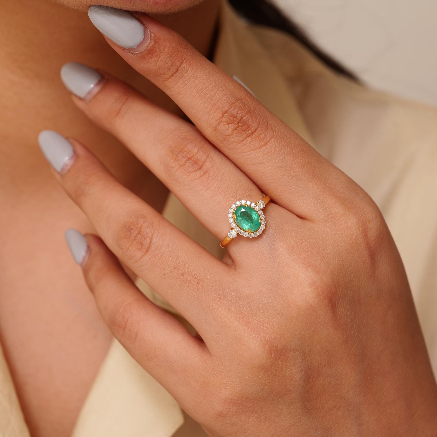 Oval Emerald Halo Diamond Ring