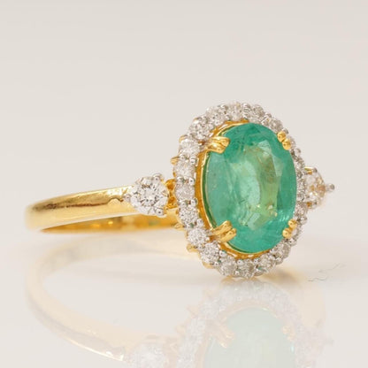 Oval Emerald Halo Diamond Ring
