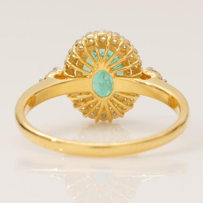 Oval Emerald Halo Diamond Ring