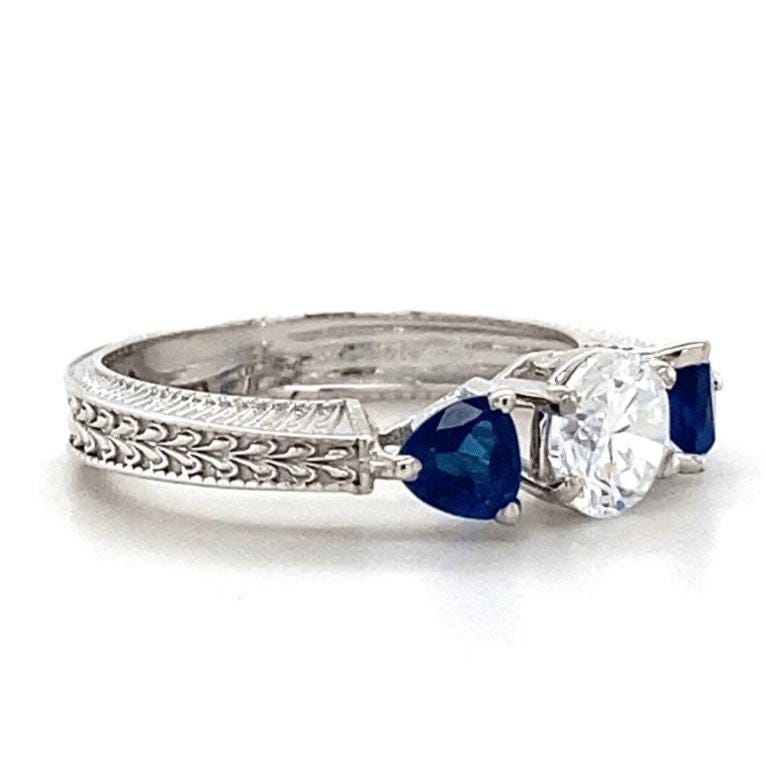 Solitaire Blue Sapphire Diamond Ring