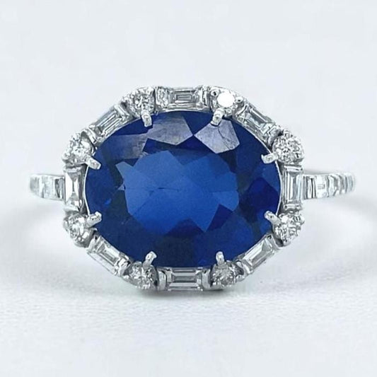 Oval Blue Sapphire Diamond Halo Ring