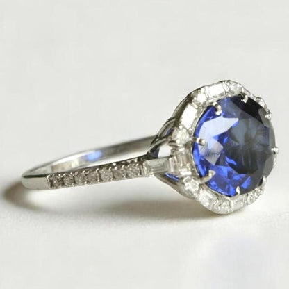 Oval Blue Sapphire Diamond Halo Ring