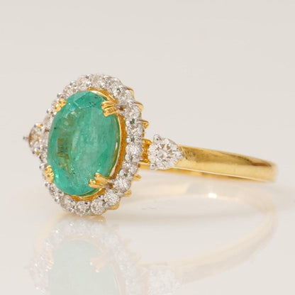 Oval Emerald Halo Diamond Ring