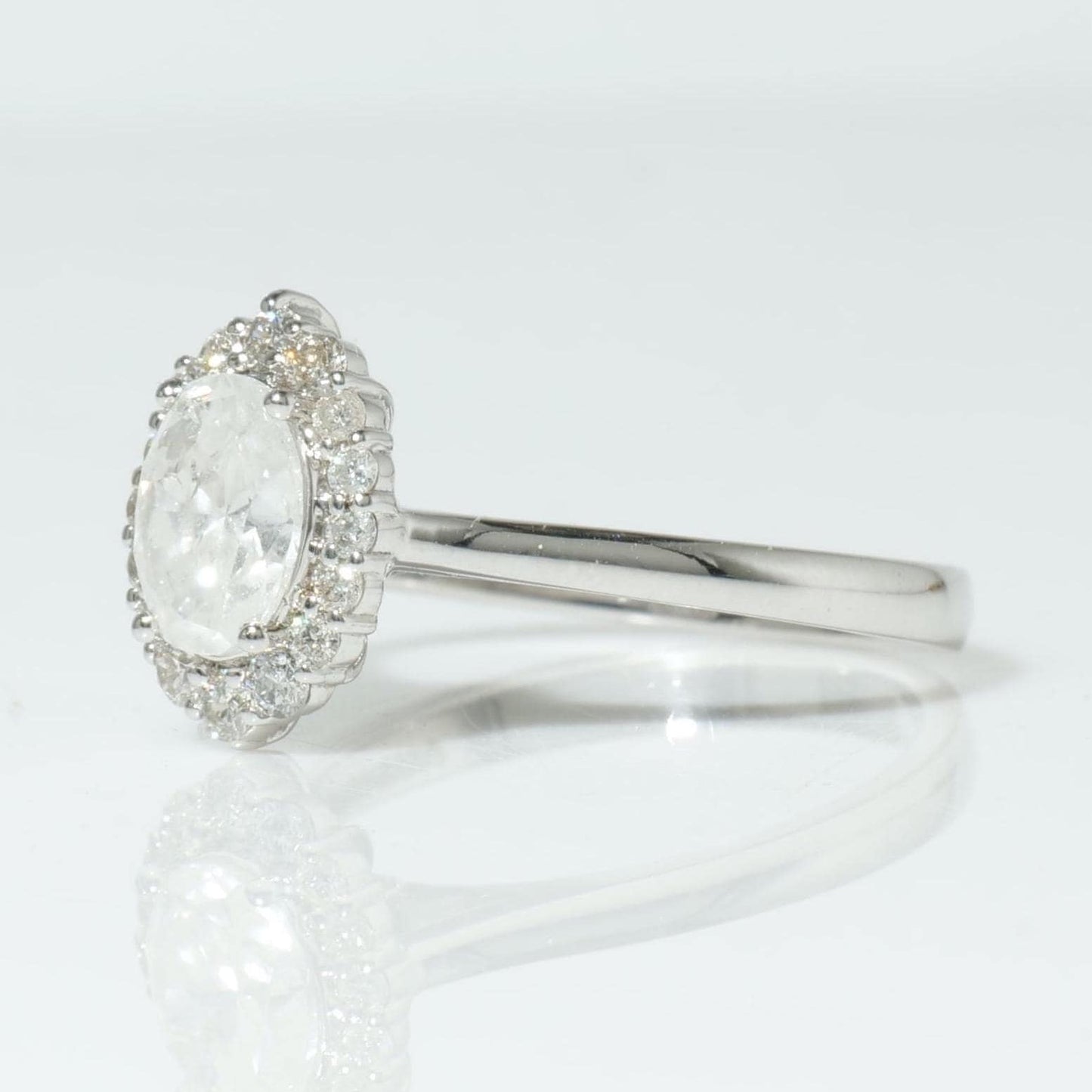 Halo Oval Solitaire Natural Diamond Ring