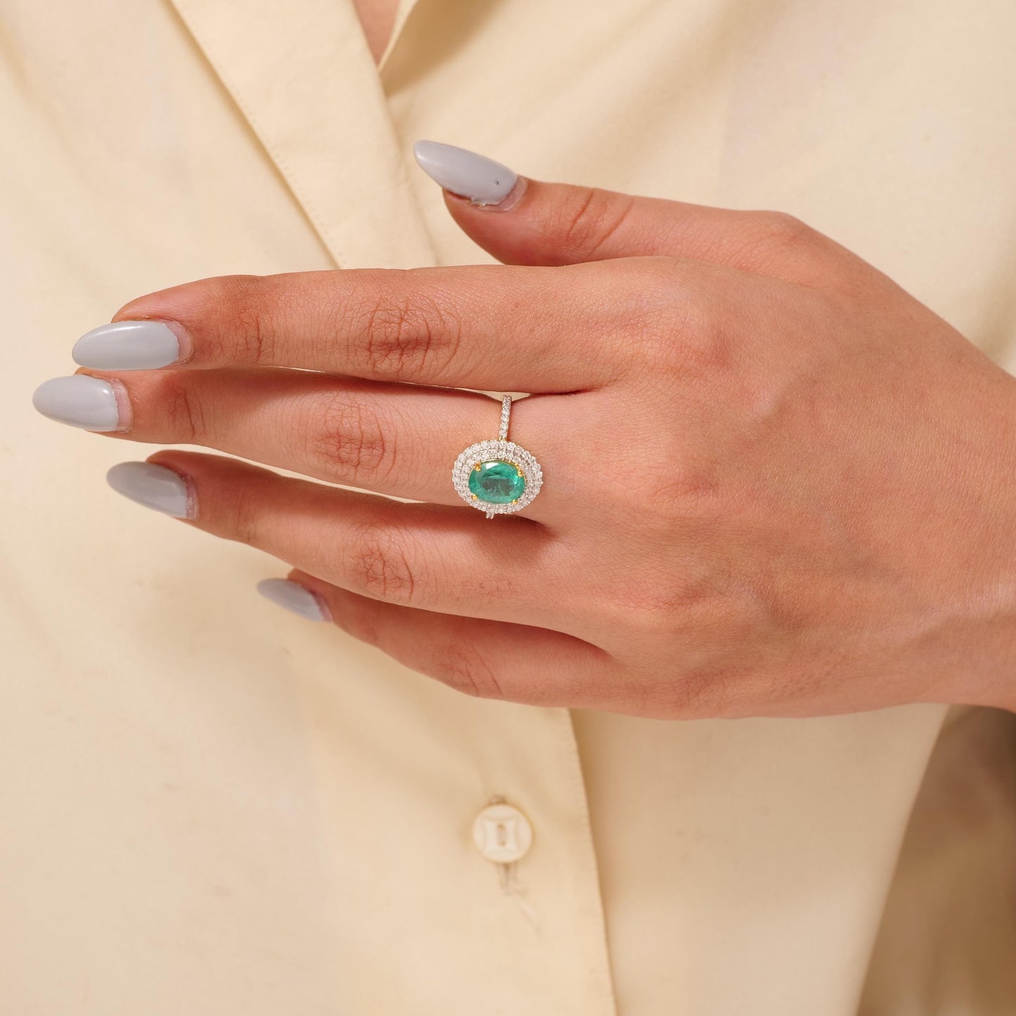 Oval Emerald Double Halo Diamond Ring