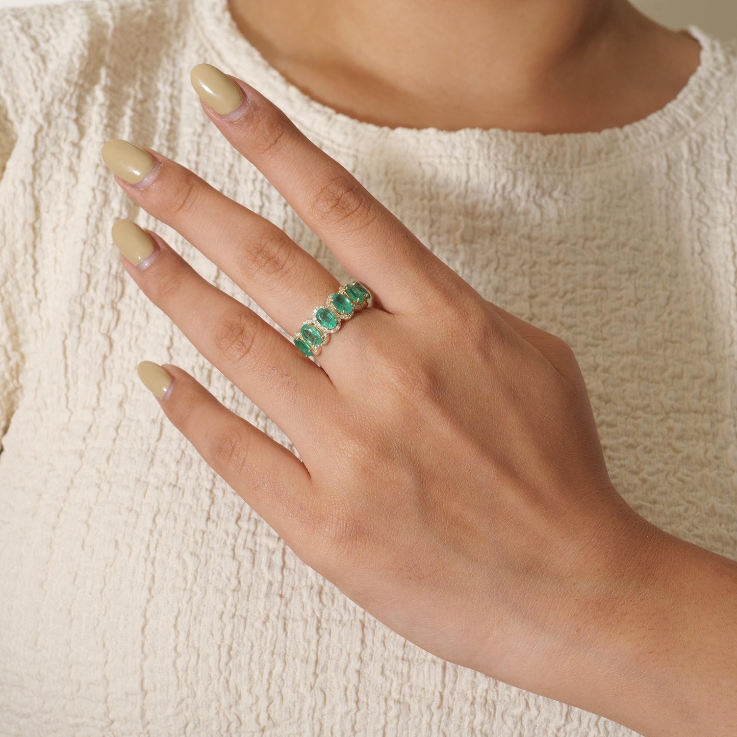 Oval Emerald Halo Diamond Ring