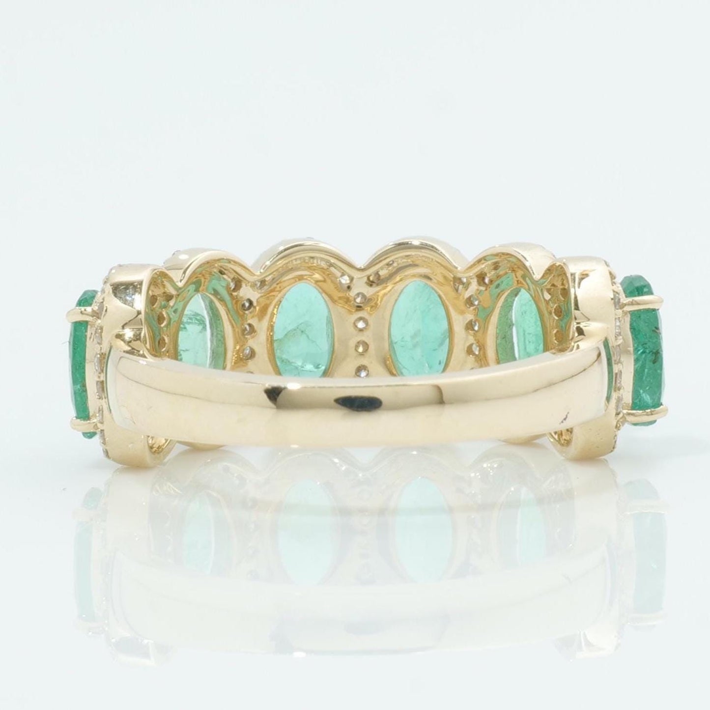 Oval Emerald Halo Diamond Ring