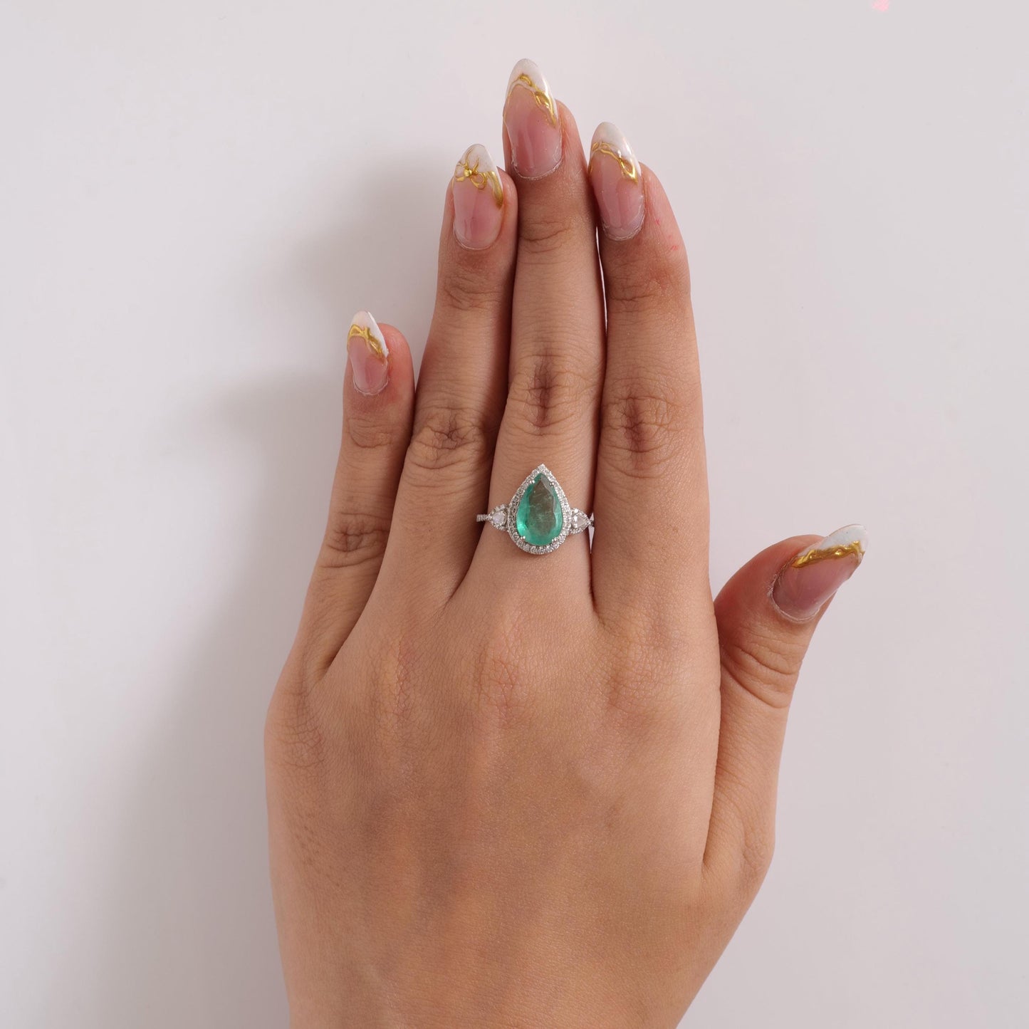Natural Pear Emerald & Diamond Halo Ring