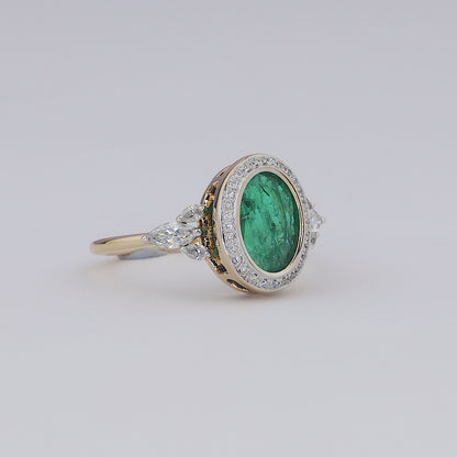 Oval Emerald Halo Diamond Ring