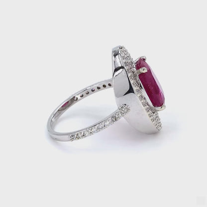 Oval Ruby Halo Diamond Ring