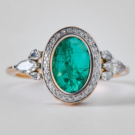 Oval Emerald Halo Diamond Ring