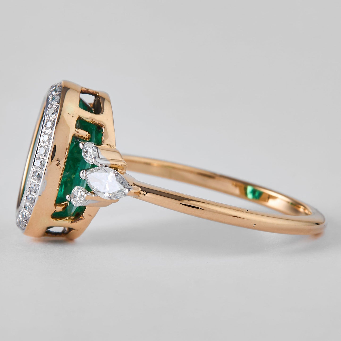 Oval Emerald Halo Diamond Ring