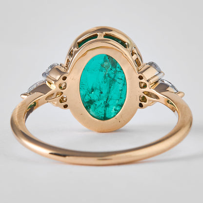 Oval Emerald Halo Diamond Ring