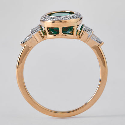 Oval Emerald Halo Diamond Ring